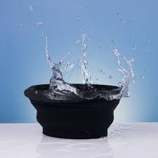 Silicone ice bowl with ice cubes and water drops